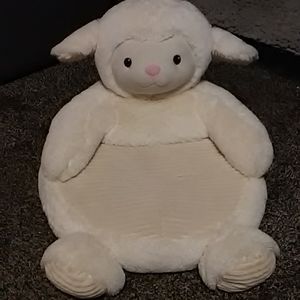 Ivory colored lamb cat bed